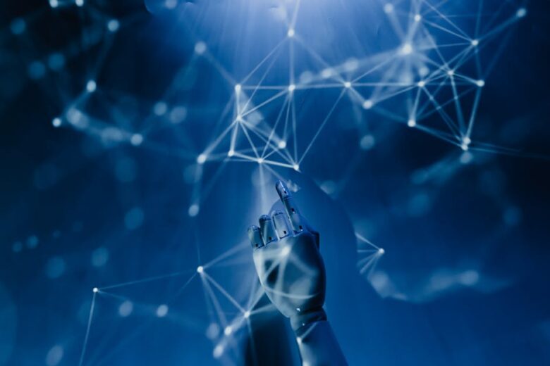 Robot pointing on a wall, photo by Tara Winstead from Pexels