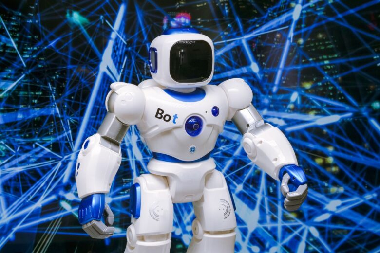 Advanced humanoid robot with glowing blue accents in a digital network setting, representing AI technology