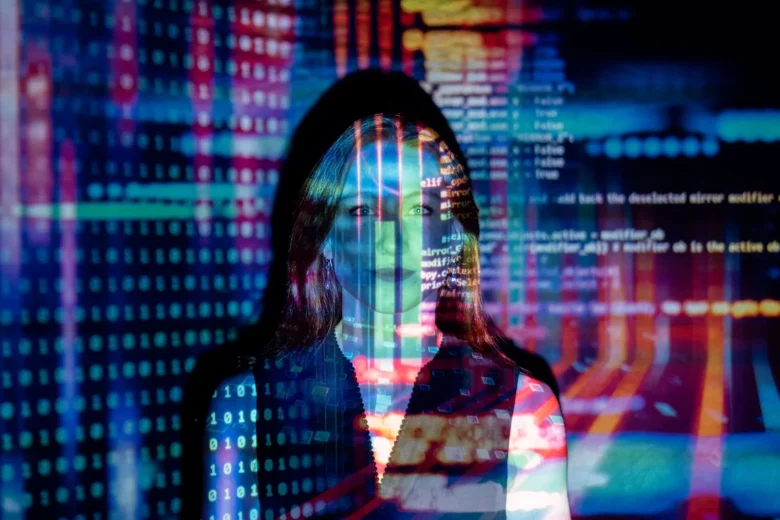 AI engineer working on cloud infrastructure and custom silicon code projected on screen