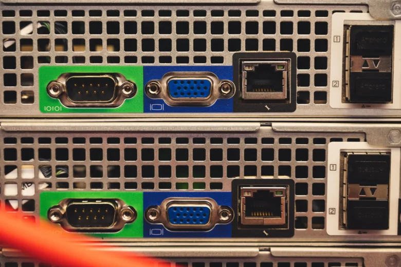 Rows of GPU accelerator servers in a cloud data center with blue ambient lighting