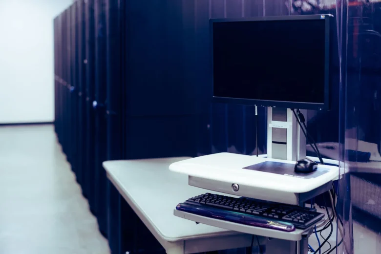 Rows of servers in a modern data center representing rented cloud AI infrastructure