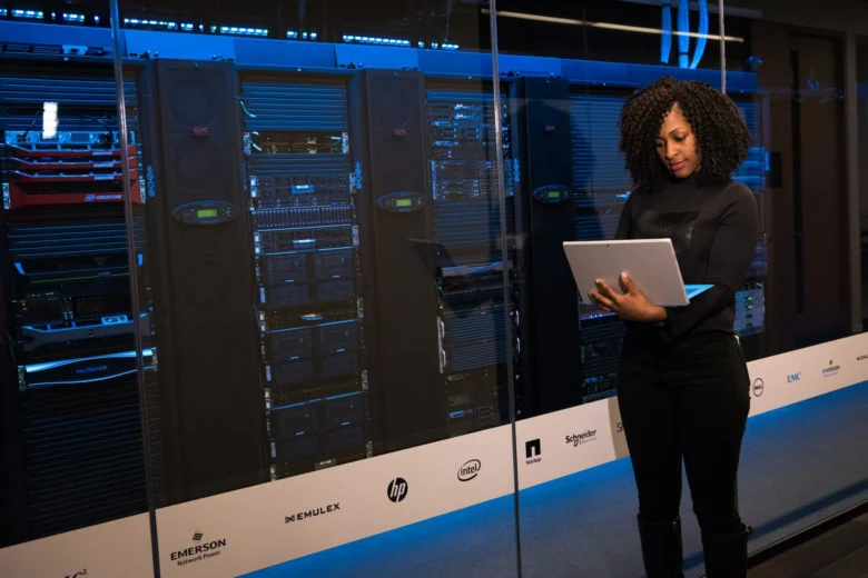 Rows of servers in a modern European data center representing cloud AI infrastructure adoption in Portugal