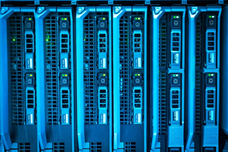 Rows of GPU servers in a data center, representing infrastructure where LLM prompt caching stores and retrieves key-value tensors