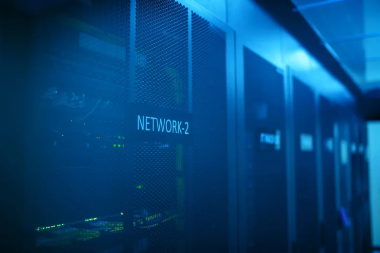 Rows of illuminated server racks in a data center hosting cloud inference workloads