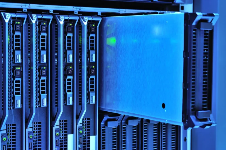 Rows of server racks in a cloud data centre representing cloud AI compute infrastructure