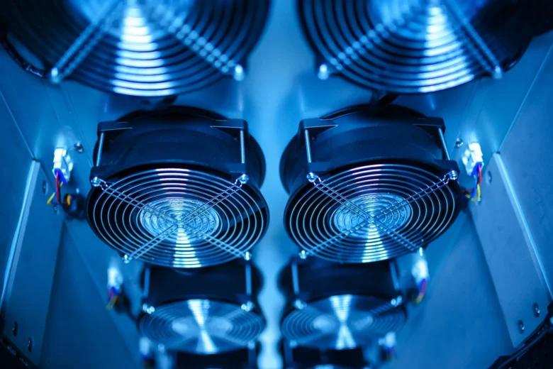 Rows of illuminated server racks in a modern data center running cloud AI workloads