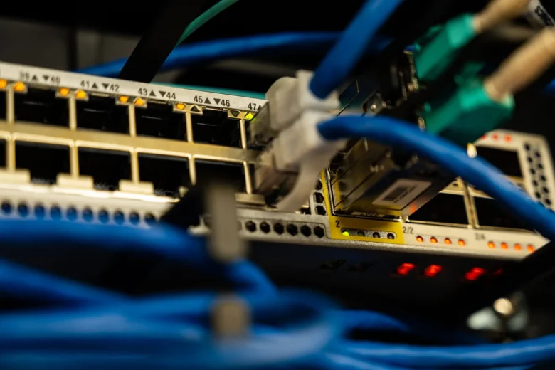 Rows of GPU servers mounted in a data center rack used for cloud AI inference workloads