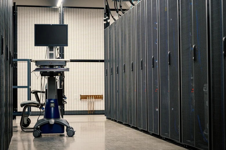 Rows of GPU-equipped server racks in a modern data center running cloud AI workloads