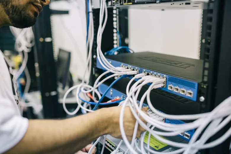 Rows of servers in a data center running large language model inference workloads