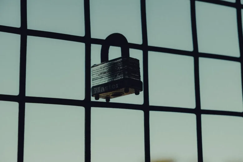 Server racks in a cloud datacenter with a digital padlock symbolizing restricted tool access for AI agents