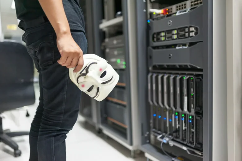 Rows of GPU accelerator servers mounted in a data center rack with blue status LEDs