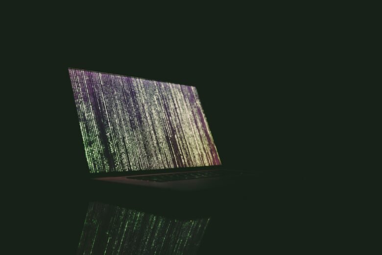 Code on a dark screen representing agent-driven reverse engineering